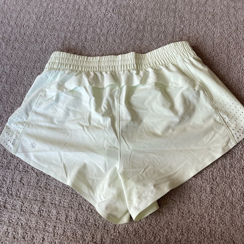Athleta light lime colored shorts
